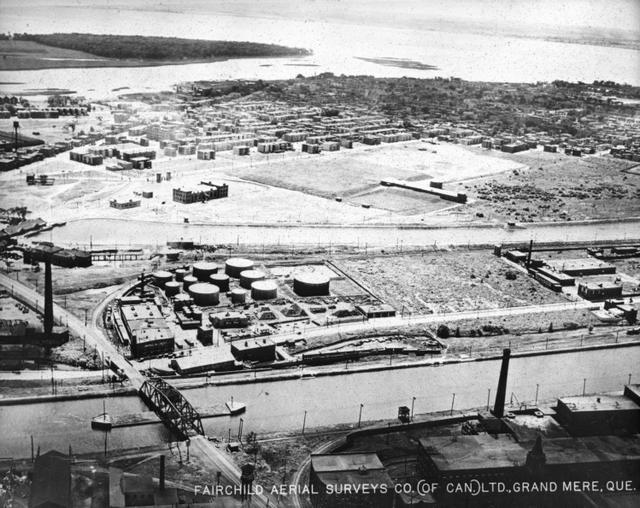 Oblique Aerial Overview of the Lachine Canal and Its Industrial Surroundings